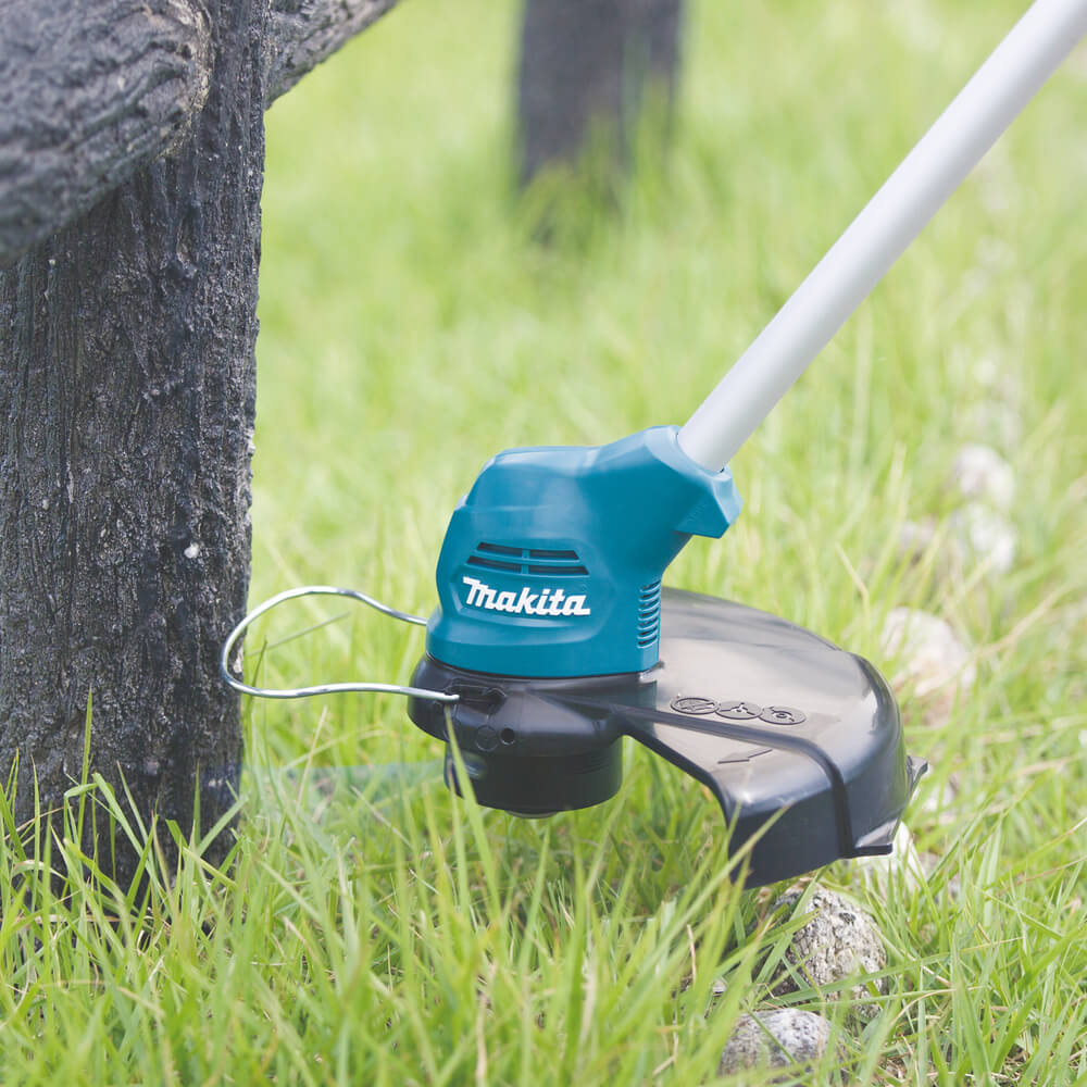 Триммер аккумуляторный MAKITA UR100DWAEX [10.8В, 2х2.0 Ач, з/у]
